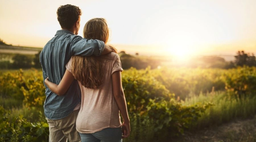 Couple looking at a field in front of them displaying Codependency in Relationships