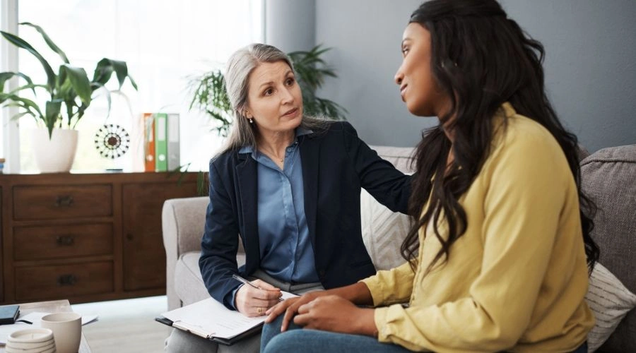 Woman getting professional help to overcome the effects of reactive abuse