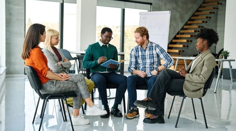 Group psychotherapy,Persons sitting in circle and talking