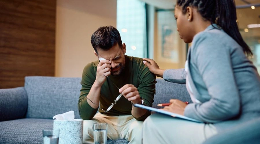 Person feeling hopeful and supported after receiving treatment for serious mental illness in Arizona