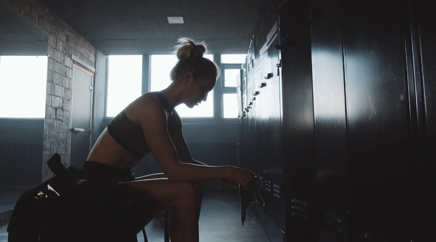 Image of an athletes struggling with mental health issues